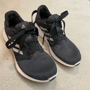 Black adidas running shoes